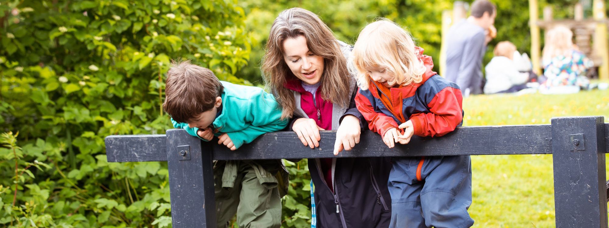 Children looking at pond