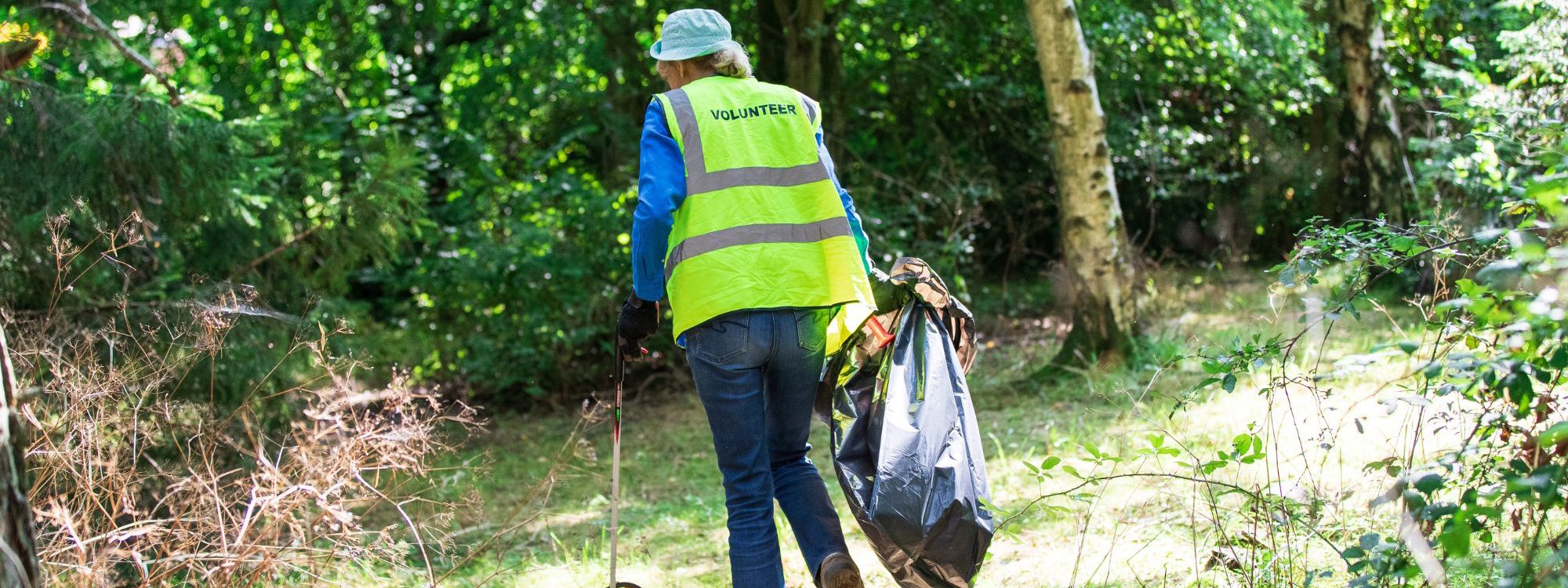 Volunteer litter picking in Milton Keynes park