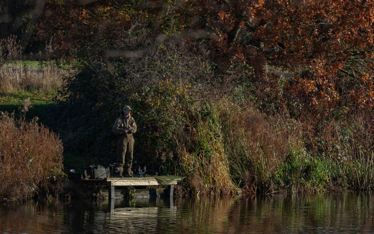 Angler stood on fishing platform