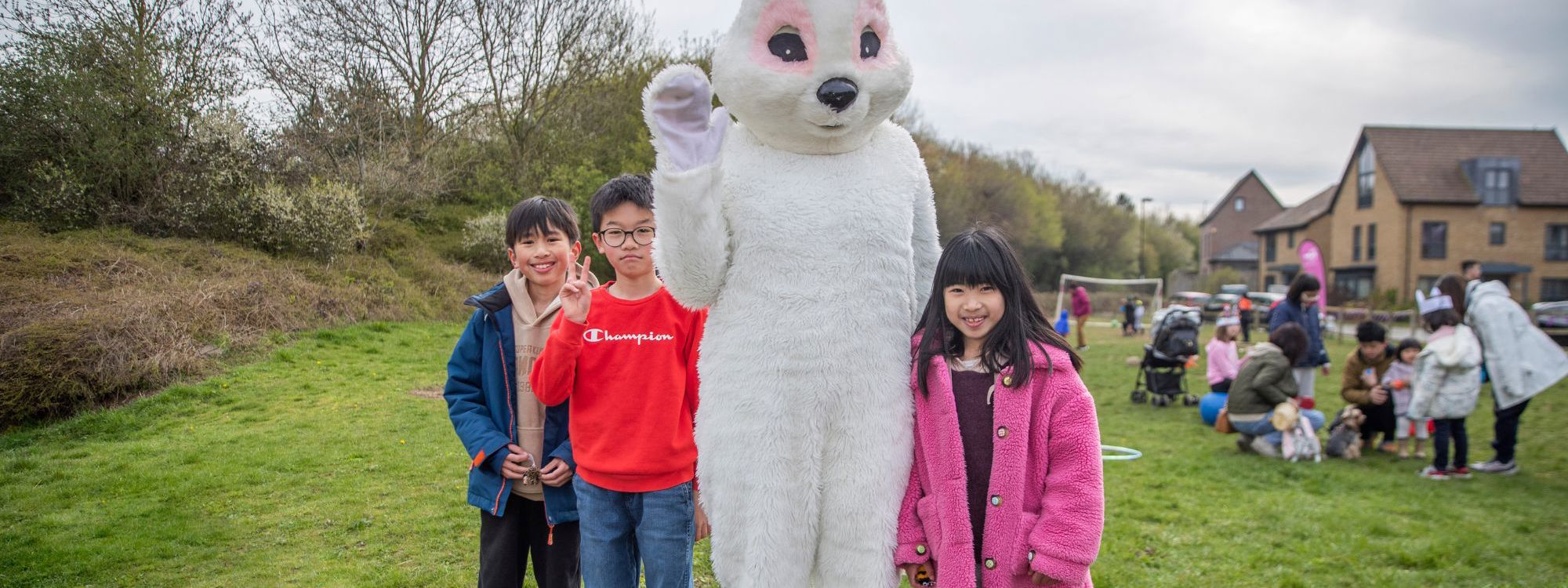 Children with Easter bunny in the park