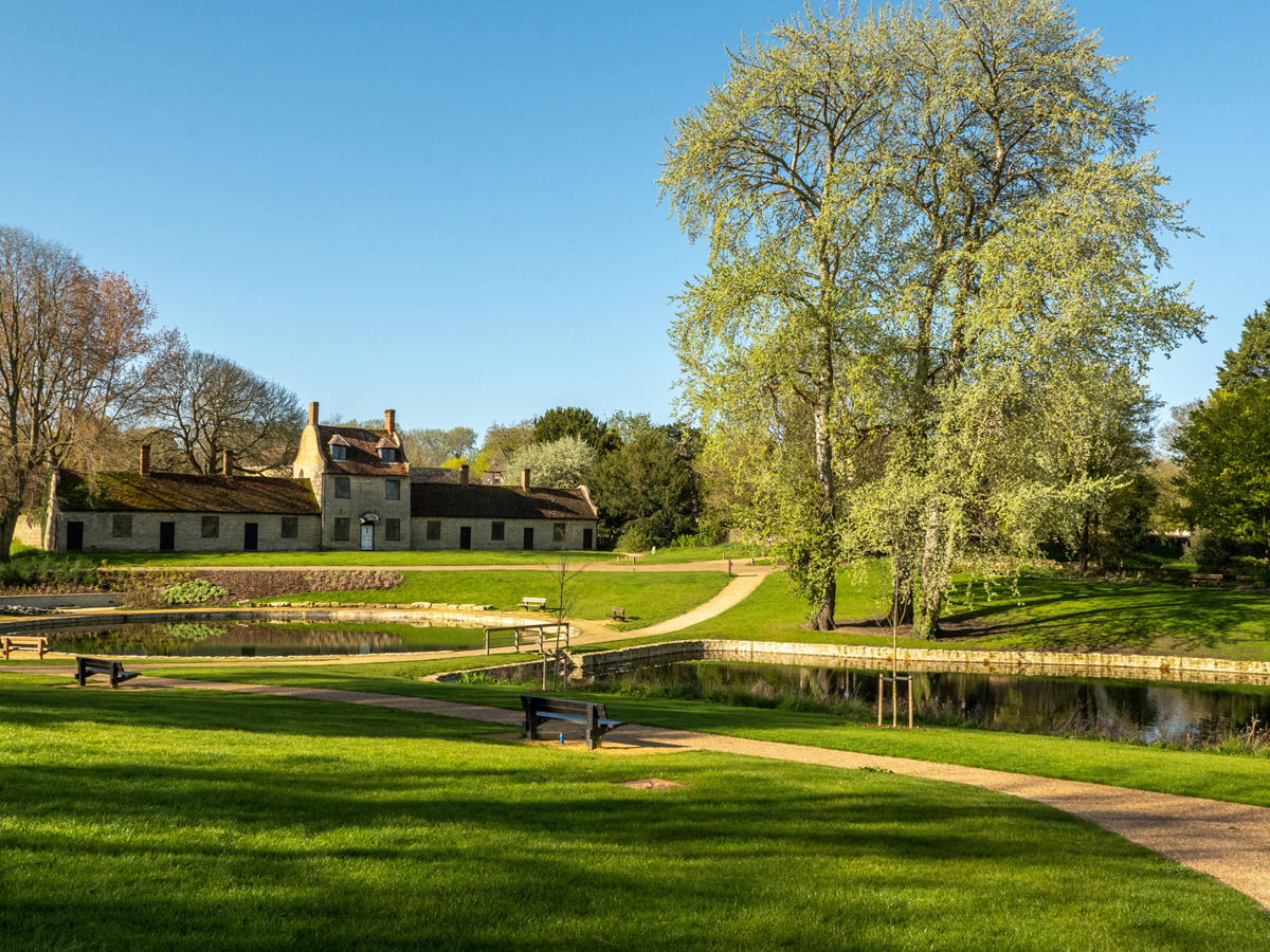 Stone building and ornamental lakes at Great Linford Manor Park.