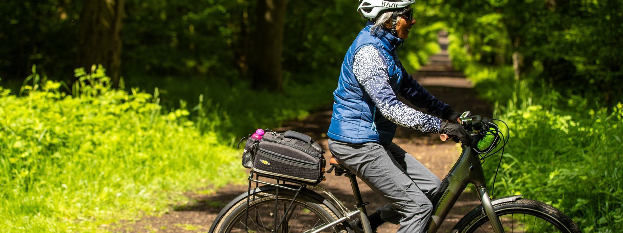 Person cycling in Milton Keynes park