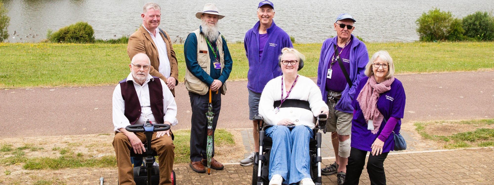 Group of The Parks Trust Access Ambassadors stood in front of Furzton Lake