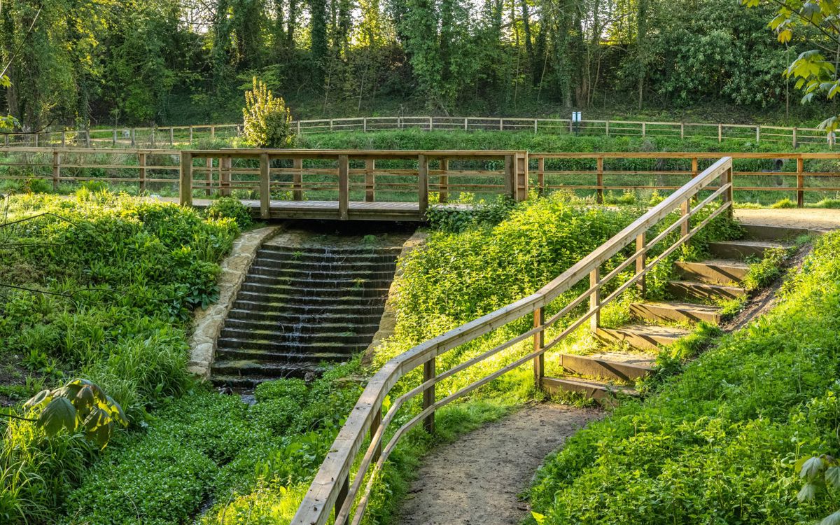 Cascade bond with bridge at Great Linford Manor Park in Milton Keynes