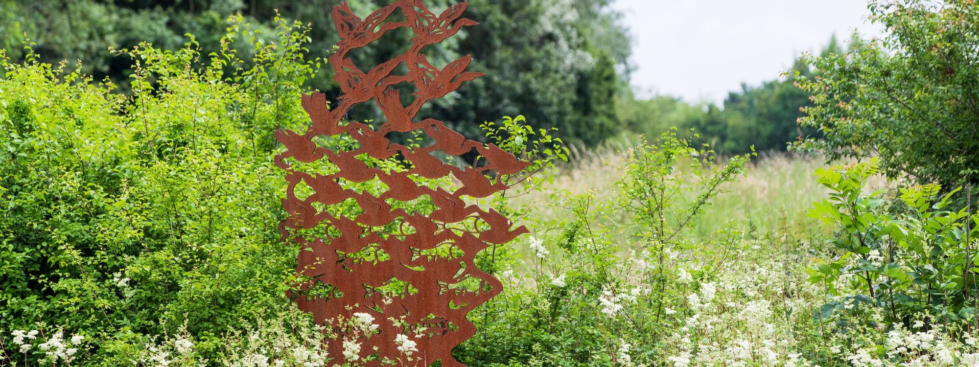 R3evolution sculpture made out of Corten steel