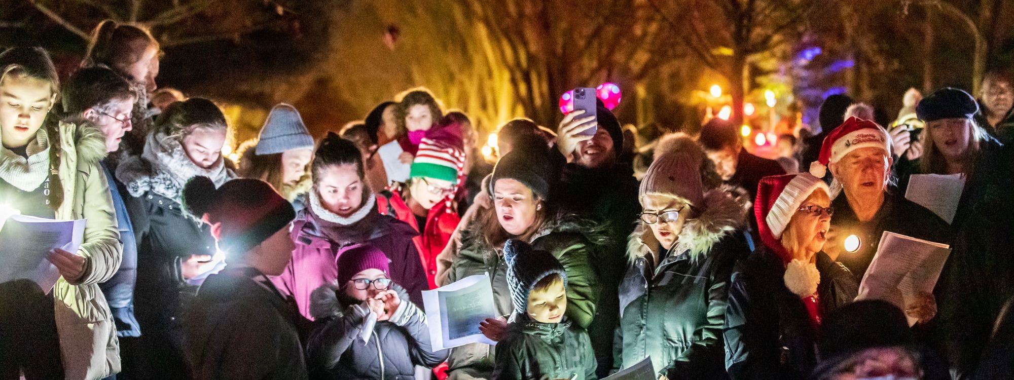 Audience at evening carols event in Milton Keynes