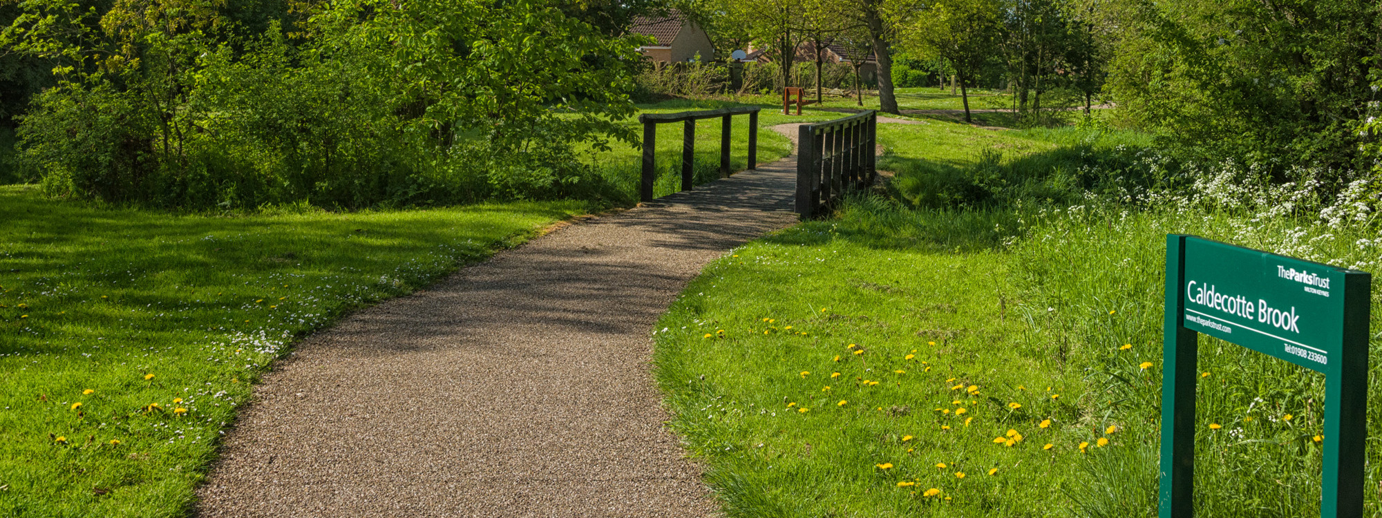 Footbridge at Caldecotte Brook park.