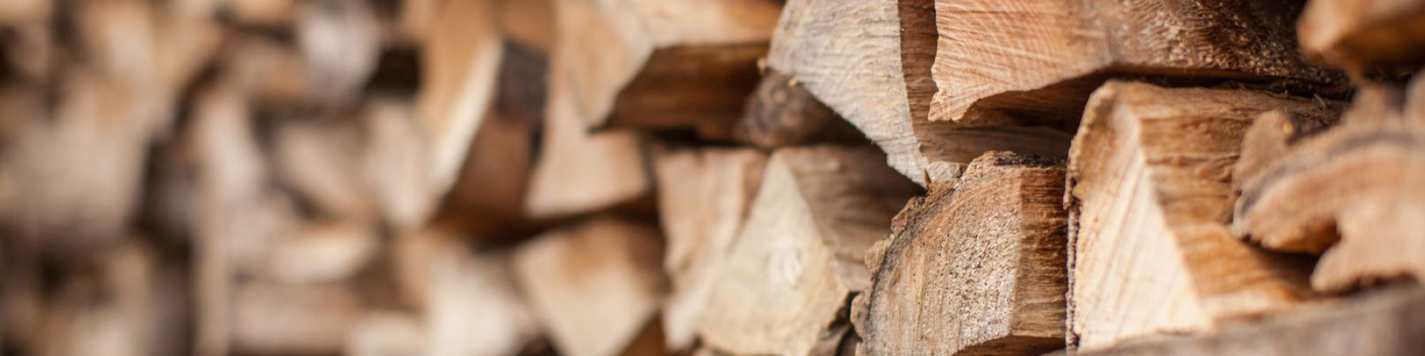 Close up view of a stack of processed firewood 