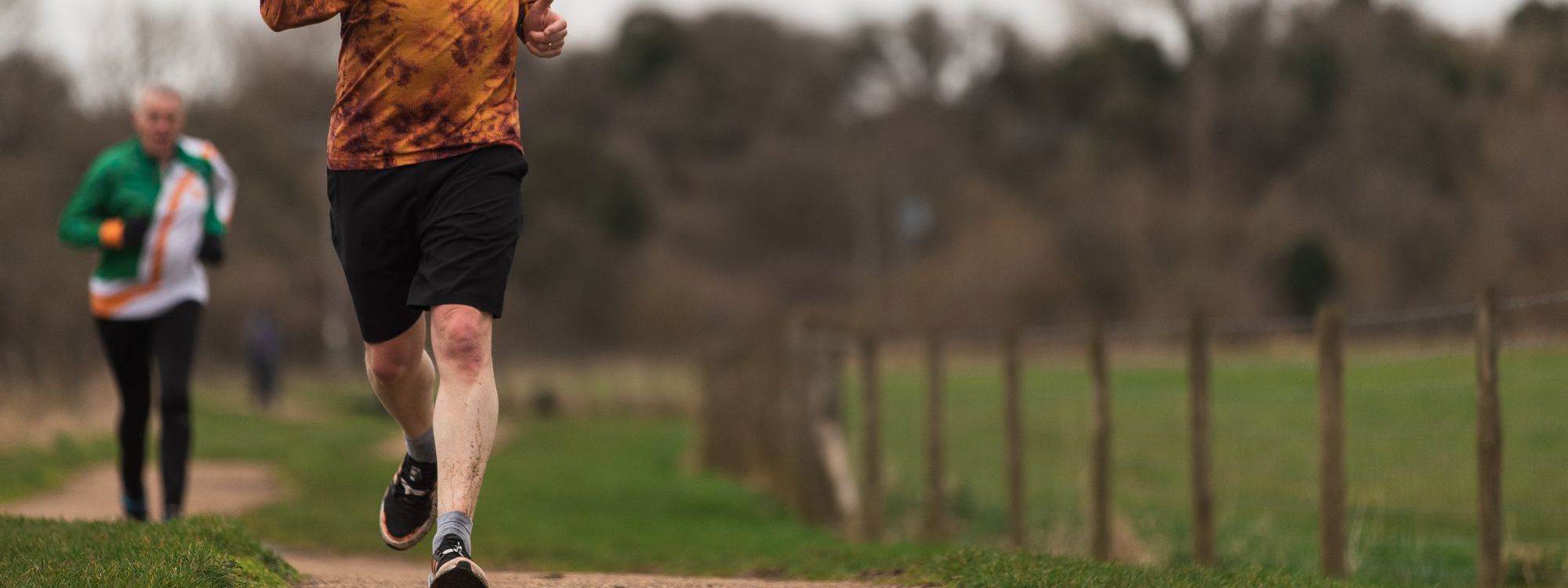 Person running through Milton Keynes park