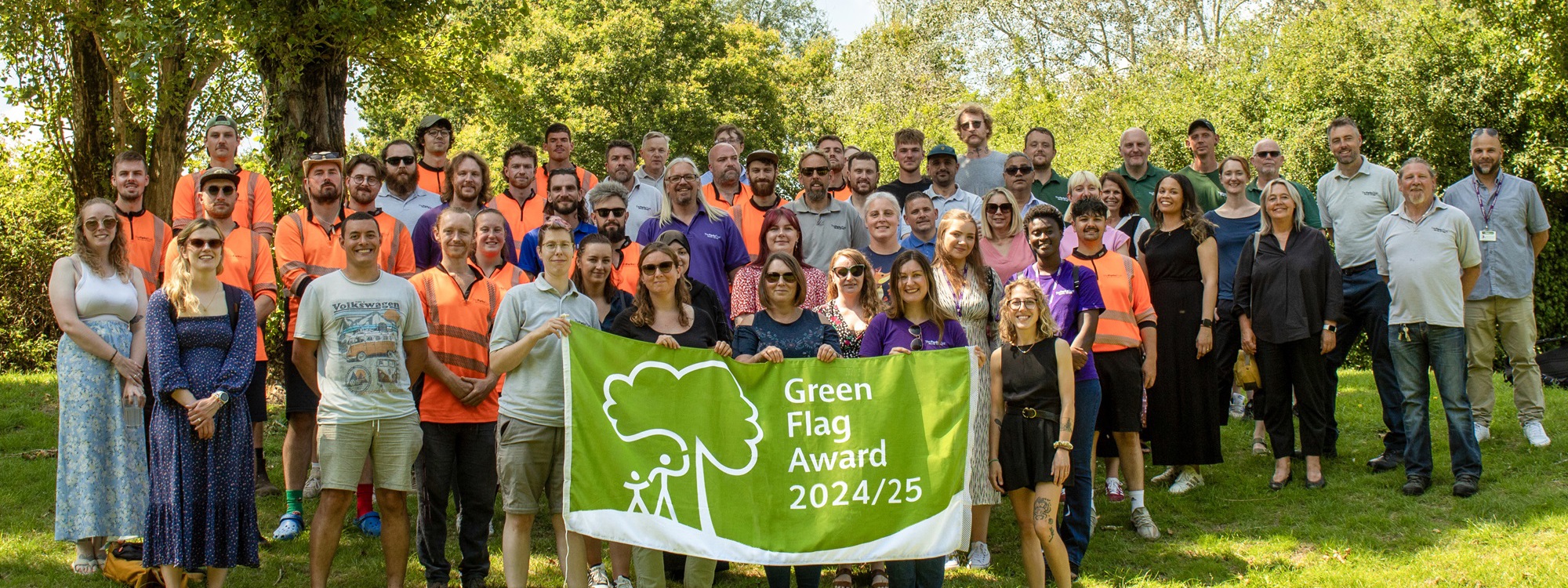 The Parks Trust team receiving their Green Flag award