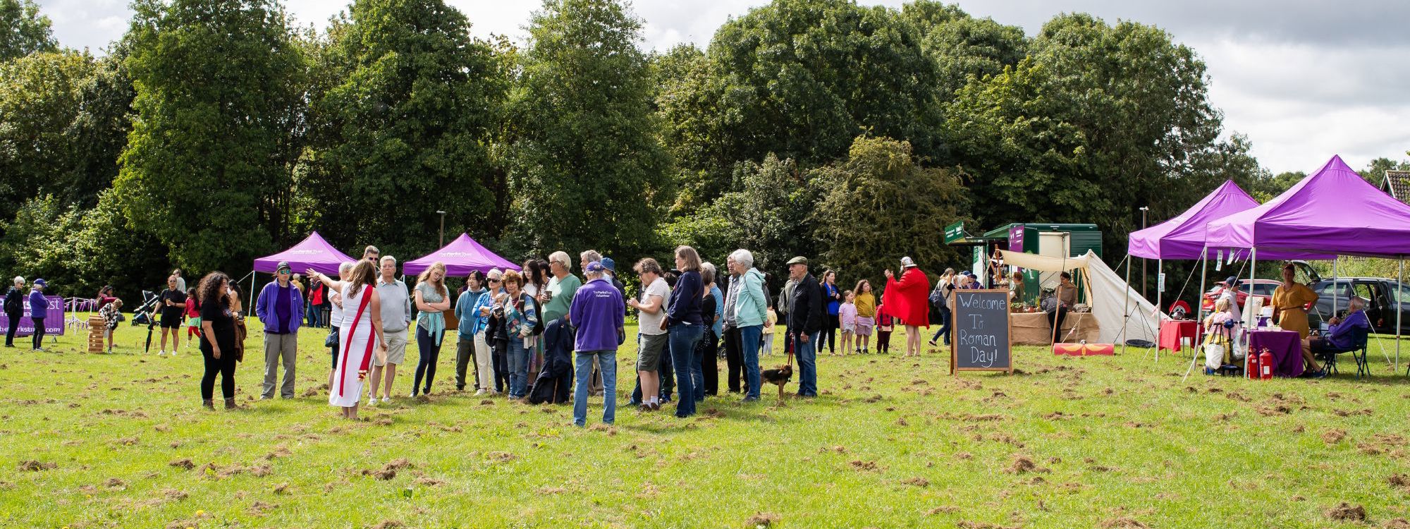 People in a park enjoying Roman Day event in Milton Keynes