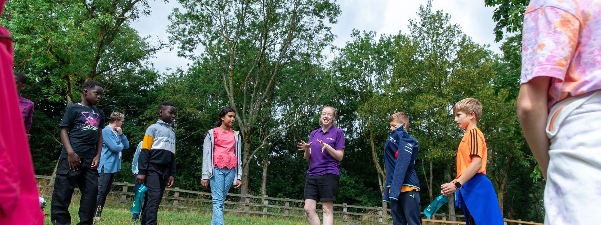 School children at an outdoor learning session in Milton Keynes park