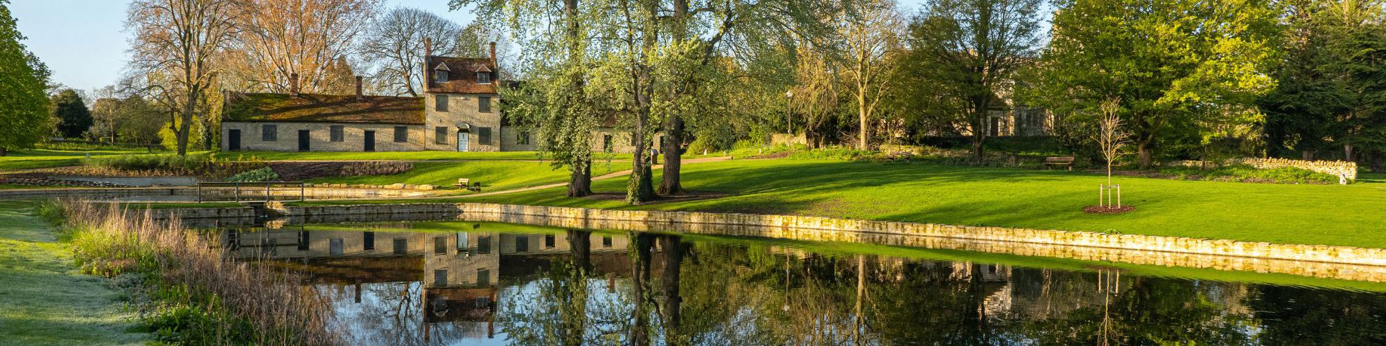 Ponds and almshouses at Great Linford Manor Park in Milton Keynes