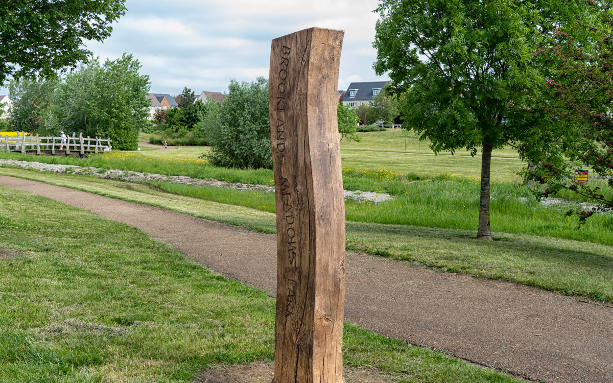Brooklands Meadow park sign and footpath.