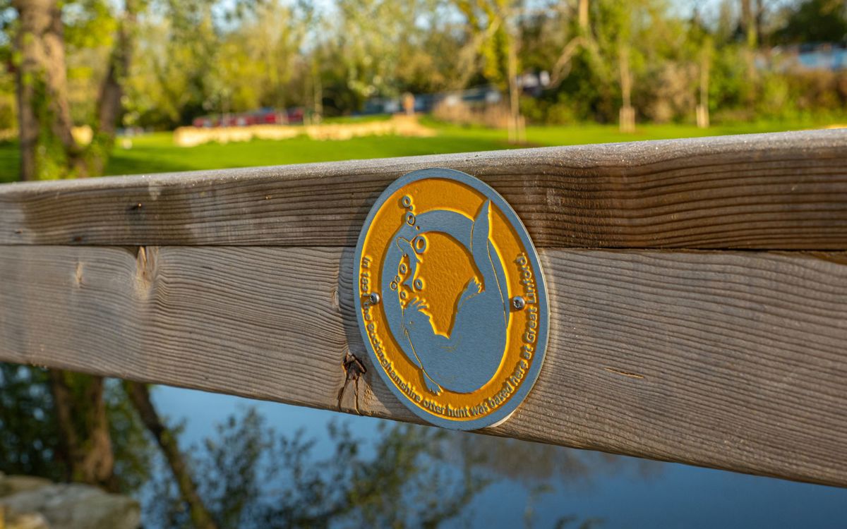 Yellow alphabet plaque in Great Linford Manor Park