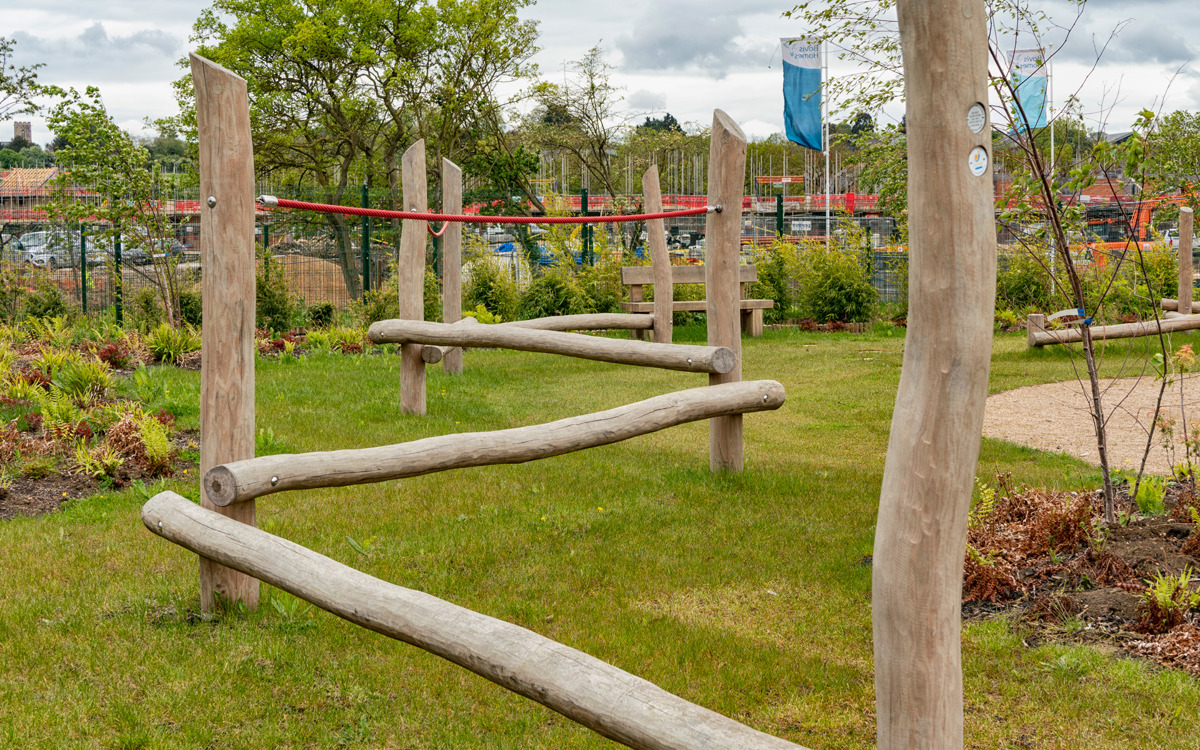 Timber balance beams at Wildwood play area, Glebe Farm.